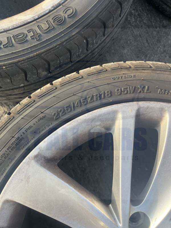 Vauxhall Astra 2010-2015 Full Set Of 18″ Alloy Wheels And Tyres – 225/45/18 ( 1 Alloy Has Scuff See Pics ) Fits Petrol Models Only
