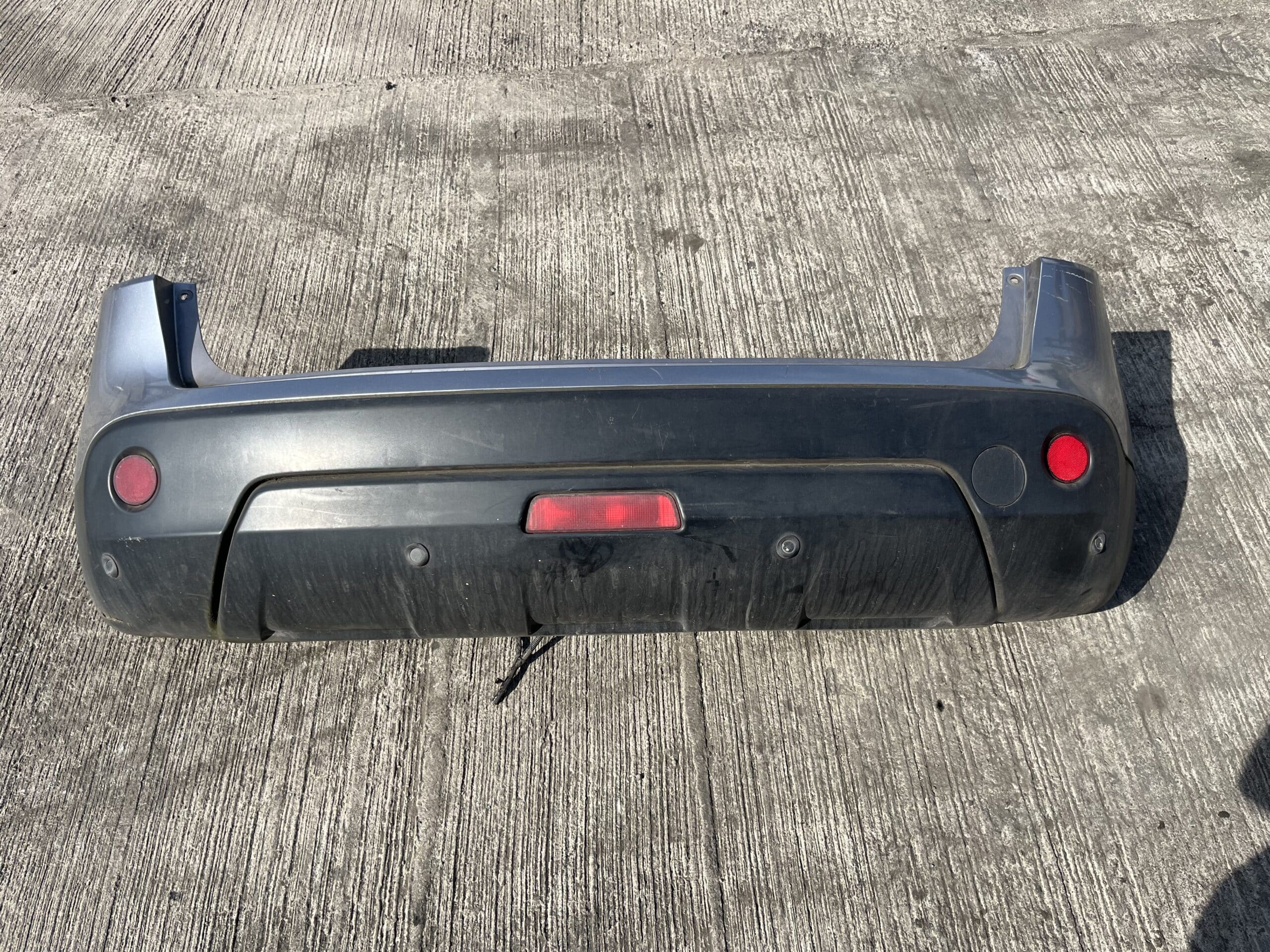 Nissan Qashqai 2010-2013 Hatchback Rear Bumper With Sensors – Silver KAQ Colour Code