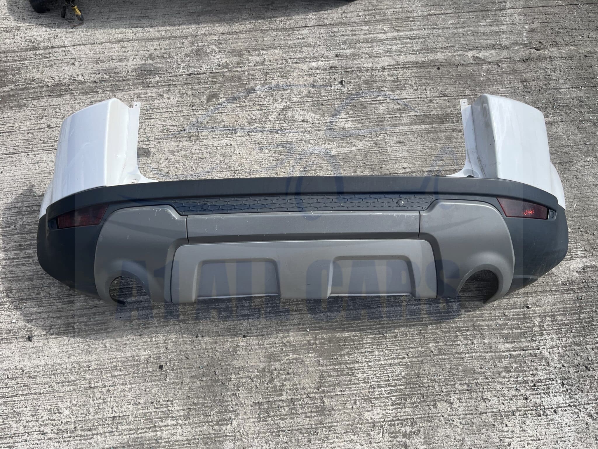 Range Rover Evoque 2011-2015 Rear Bumper With Sensors – White 867 Colour Code