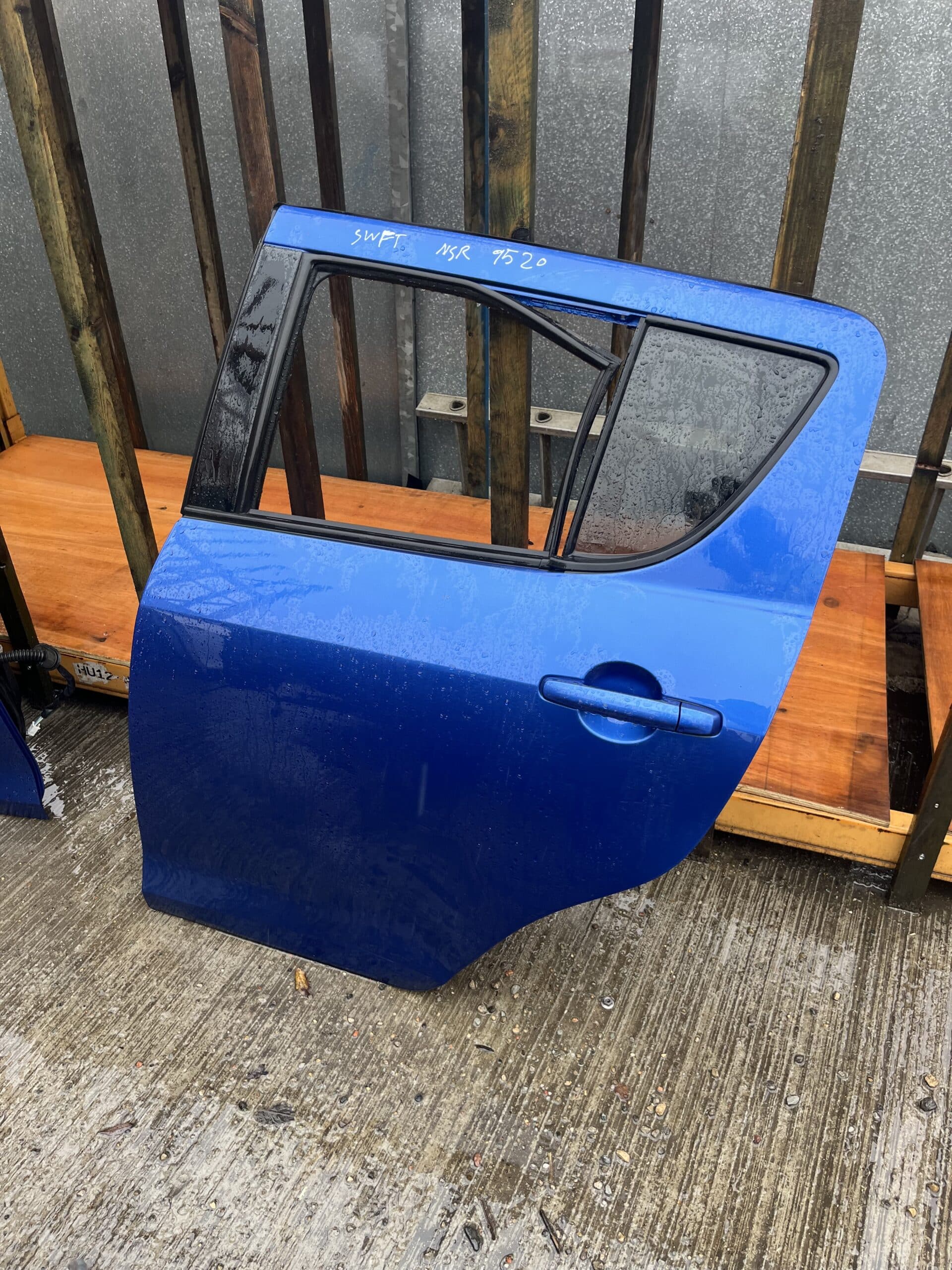 Suzuki Swift 2011-2017 5 Door Hatchback Near Side Rear Door – Blue ZUM Colour Code ( Call Office For Delivery Quote ) Slight Dent Near Bottom