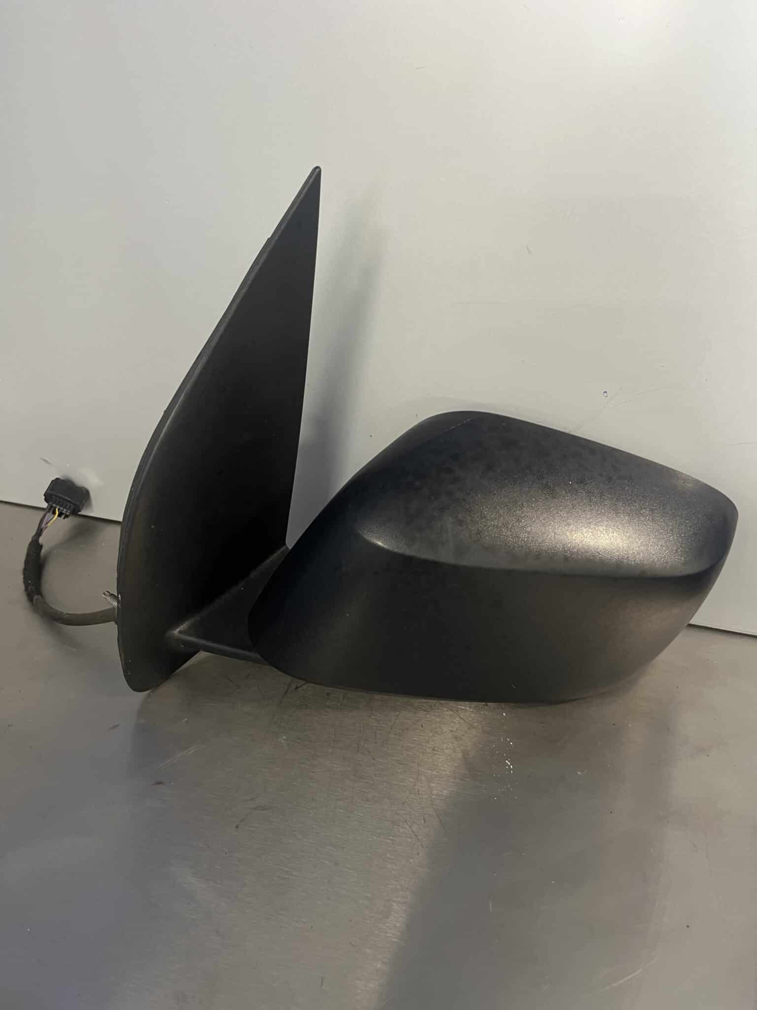 Nissan Navara 2005-2010 Near Side Electric Door Mirror – Black Plastic