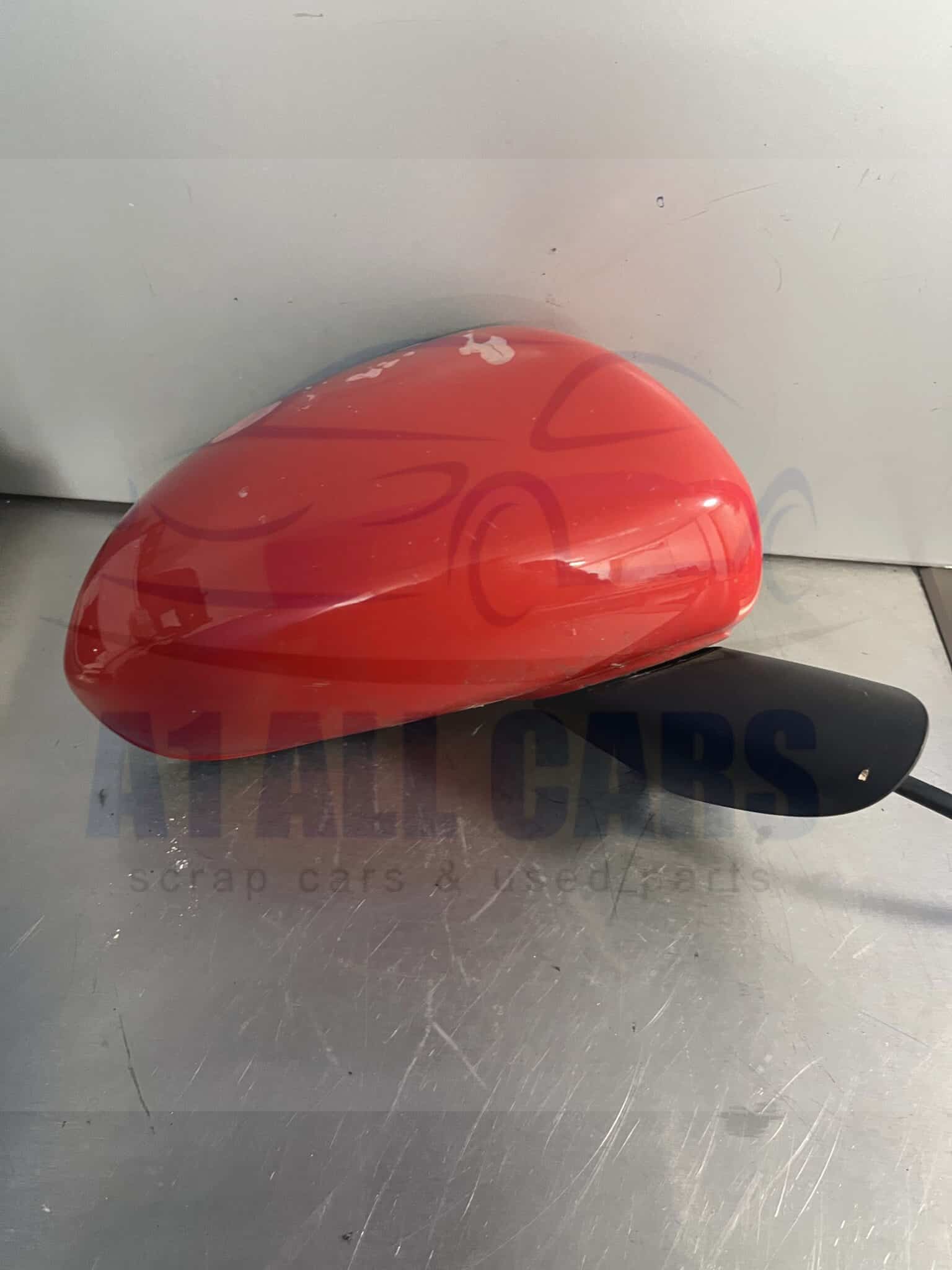 Vauxhall Corsa 2006-2014 Off Side Electric Door Mirror – Red Z547 Colour Code ( Small Paint Peel )